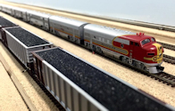 Welcome to the Los Angeles N-Scale Association, operators of East Valley Lines Model Railroad located since 1979 in the Travel Town Museum at Griffith Park. View pitchers of the East Valley Lines N Scale Model Railroad and see what they have done to their N scale layout. They operate one of the largest N-Scale layouts in the world. This is just a brief trip on the East Valley Lines' trackage. As you observe closely, there are lots of details to enjoy. This is truly a labor of love, involving countless hours, money and the talents of the many N-Scale modelers dedicated to the memory of great railroads. Brought to you to by www.krafttrains.com