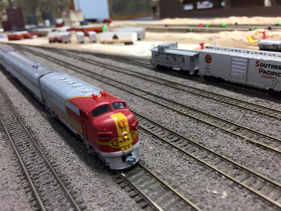 Welcome to the Los Angeles N-Scale Association, operators of East Valley Lines Model Railroad club located since 1979 in the Travel Town Museum at Griffith Los Angeles, California. View pitchers of the East Valley Lines N Scale Model Railroad club and see what they have done to their N scale layout. They operate one of the largest N-Scale layouts in the world. This is just a brief trip on the East Valley Lines' trackage. As you observe closely, there are lots of details to enjoy. This is truly a labor of love, involving countless hours, money and the talents of the many N-Scale modelers dedicated to the memory of great railroads. Brought to you to by www.krafttrains.com