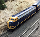Welcome to the Los Angeles N-Scale Association, operators of East Valley Lines Model Railroad located since 1979 in the Travel Town Museum at Griffith Park. View pitchers of the East Valley Lines N Scale Model Railroad and see what they have done to their N scale layout. They operate one of the largest N-Scale layouts in the world. This is just a brief trip on the East Valley Lines' trackage. As you observe closely, there are lots of details to enjoy. This is truly a labor of love, involving countless hours, money and the talents of the many N-Scale modelers dedicated to the memory of great railroads. Brought to you to by www.krafttrains.com