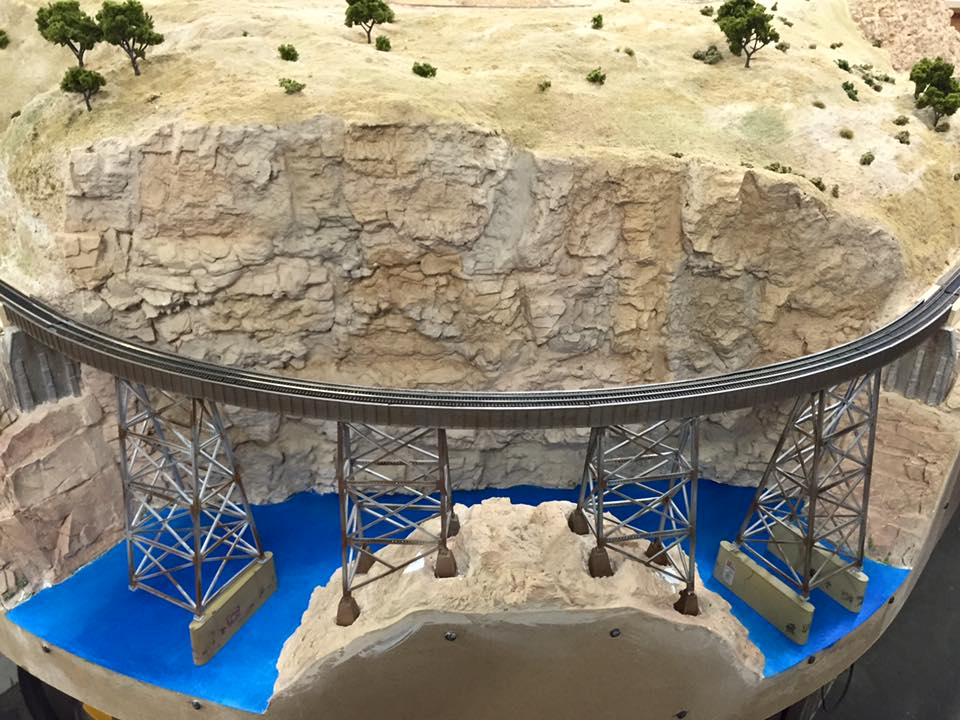 Welcome to the Los Angeles N-Scale Association, operators of East Valley Lines Model Railroad club located since 1979 in the Travel Town Museum at Griffith Los Angeles, California. View pitchers of the East Valley Lines N Scale Model Railroad club and see what they have done to their N scale layout. They operate one of the largest N-Scale layouts in the world. This is just a brief trip on the East Valley Lines' trackage. As you observe closely, there are lots of details to enjoy. This is truly a labor of love, involving countless hours, money and the talents of the many N-Scale modelers dedicated to the memory of great railroads. Brought to you to by www.krafttrains.com