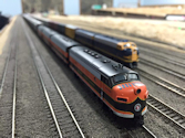 Welcome to the Los Angeles N-Scale Association, operators of East Valley Lines Model Railroad located since 1979 in the Travel Town Museum at Griffith Park. View pitchers of the East Valley Lines N Scale Model Railroad and see what they have done to their N scale layout. They operate one of the largest N-Scale layouts in the world. This is just a brief trip on the East Valley Lines' trackage. As you observe closely, there are lots of details to enjoy. This is truly a labor of love, involving countless hours, money and the talents of the many N-Scale modelers dedicated to the memory of great railroads. Brought to you to by www.krafttrains.com