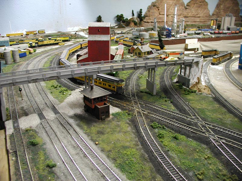 The PikeMasters Railroad Club, Was founded in 1988, currently is the only model railroad club operating a permanent layout in Colorado Springs CO, United State. The PikeMasters have been in the City Auditorium site since 1996. The current facility at one time housed the Colorado Springs Police Department indoor pistol firing range. The PikeMasters Model Railroad Club is located in the basement of the City Auditorium. The auditorium is located at 221 East Kiowa, Kiowa and Weber streets, in downtown Colorado Springs CO, across the street from Municipal Court. All visitors are welcome and club members will be present to explain the operation and to answer any questions. We will be operating the trains during this time. For more model Train Clubs visit www.krafttrains.com 